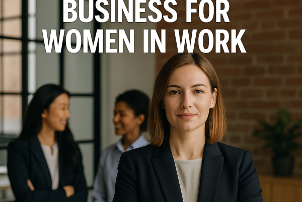 Three professional women in business attire stand in a modern office space, with bold text reading “We’re Doing the Business for Women in Work” overlaid on the image.