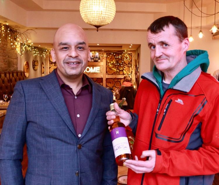 Shaf Rasul receiving prize for top fundraiser at Social Bite’s CEO Sleepout