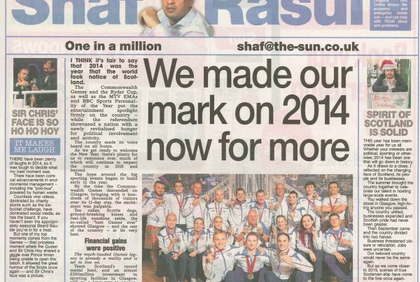 Newspaper column featuring Shaf Rasul with the headline “Scotland’s year to remember,” reviewing major events from 2014, the referendum, national unity, charity highlights, humour from the Queen, and a tragic Glasgow accident.
