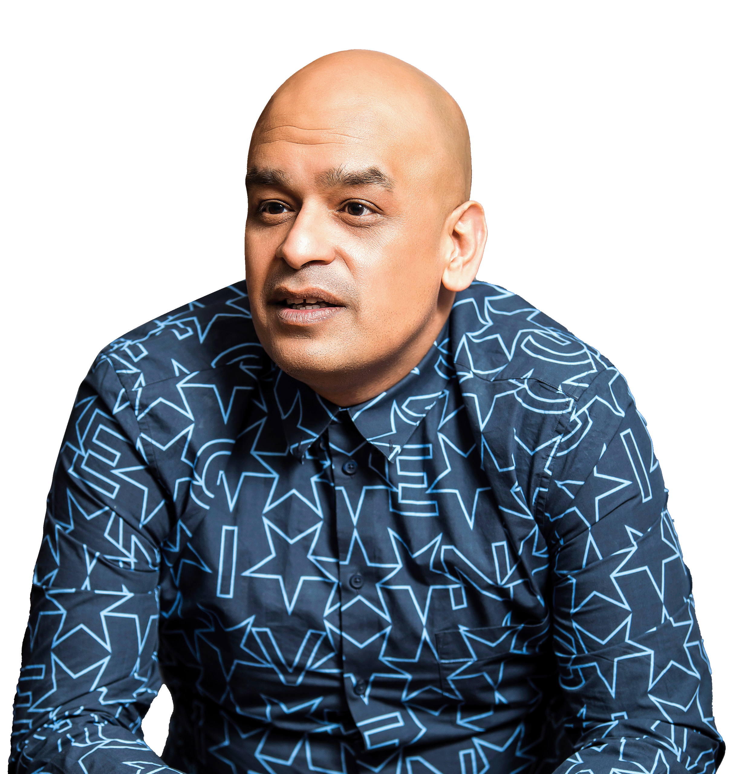 Shaf Rasul, Scottish entrepreneur, investor, and business mentor, wearing a patterned shirt against a black background