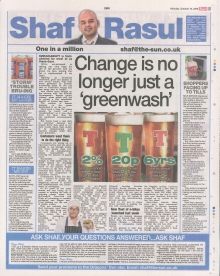 A newspaper column layout featuring the headline “Change is no longer just a greenwash,” with sections on eco-friendly initiatives, self-service checkout honesty experiments, an obesity debate in England, and humorous commentary on Irn Bru’s recipe secrecy.