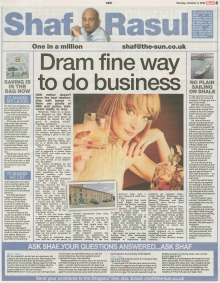 A newspaper scan featuring Shaf Rasul’s column titled “Dram Fine Way to Do Business,” discussing Scotland’s booming drinks industry, record whisky exports, new distilleries, and a social enterprise gin that invests in youth initiatives.