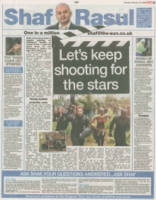 A full-page newspaper scan featuring Shaf Rasul’s column on Scotland’s film industry, plus stories on broadband issues, university access, and a tiger hoax call.
