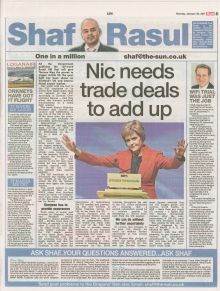 A newspaper page featuring the main column on Scotland’s trade balance with the UK and EU, side notes on jobcentre closures, a serious piece on RBS losses, and a humorous piece on the world’s shortest flight.
