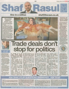 A newspaper page featuring Shaf Rasul’s column discussing recent developments in trade deals for Scotland with the EU and China, plus notes on Scotland’s first Street Food Awards and a humorous piece about a giant Maine Coon cat.
