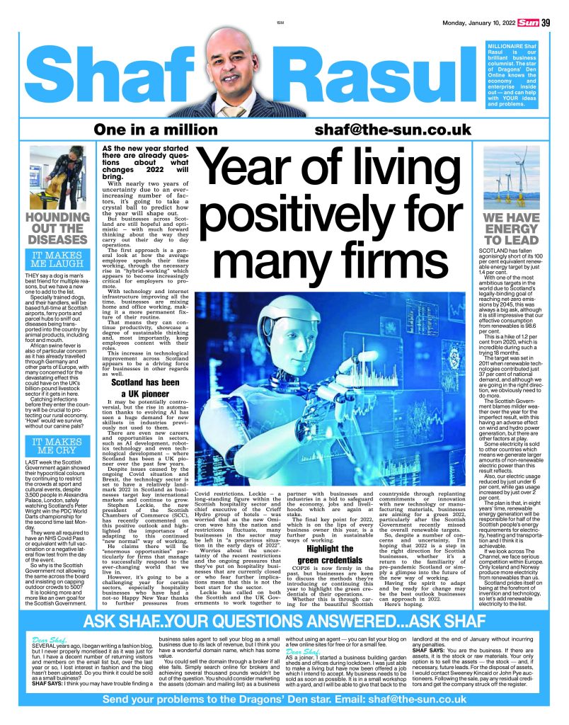 Newspaper column with a headline on business optimism, alongside segments about renewable targets, disease-sniffing dogs, and event crowd restrictions.
