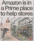 A headline reading "Amazon is in a prime place to help stores," overlaid on an image of a high street with closed shopfronts and an Amazon delivery van in the background.