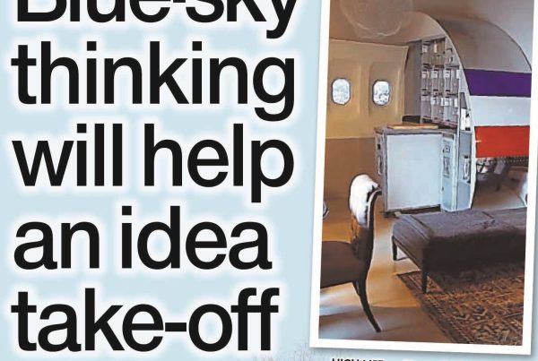 Shaf Rasul smiling beside a repurposed airplane galley setup with tools and solar panels in the background. Banner headline reads: “Blue-Sky Thinking Will Help Idea Take Off”.