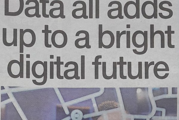 Futuristic digital interface with Scottish landmarks overlaid with data visuals and the headline “Data all adds up to a bright digital future”