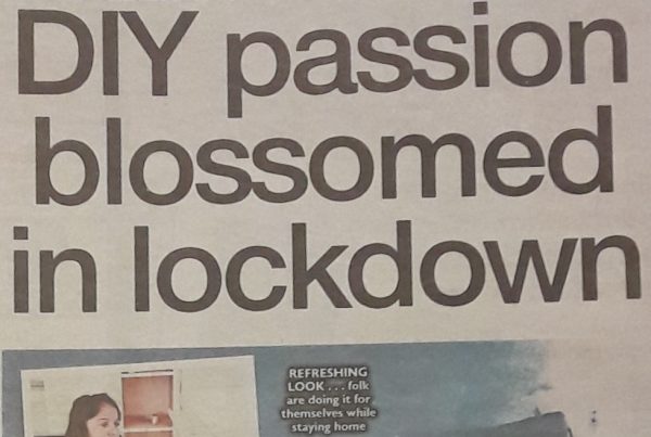 A DIY enthusiast painting a garden shed with flowers blooming nearby; overlaid with the headline “DIY passion blossomed in lockdown”