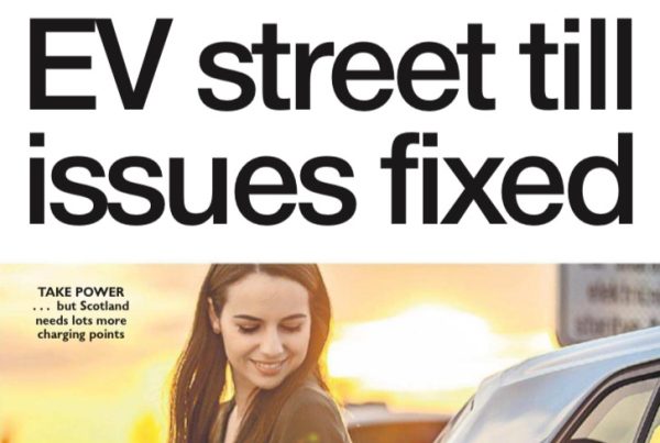 Electric car charging at a public station with digital meter visible. Banner text overlaid.