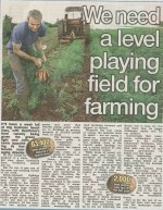 A generated image featuring farming fields, tractors, livestock, and Brexit graphics, with the headline “We Need a Level Playing Field for Farming” embossed over related graphics.