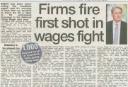 A generated image featuring a battle between Scottish pound coins and wage bills, with the headline “Firms Fire First Shot in Wages Fight” embossed over related graphics.