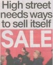 Headline reading "High street needs ways to sell itself" with a background showing a busy Scottish high street with Christmas shoppers.