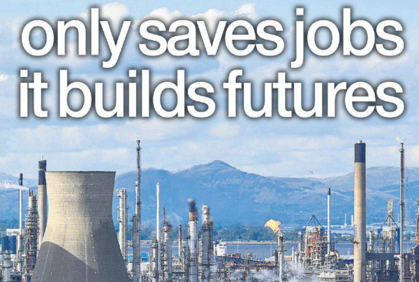 Industrial plant with cooling towers and chimneys under a blue sky, overlaid with a large red “CLOSED” stamp and the headline “Investment not only saves jobs it builds future