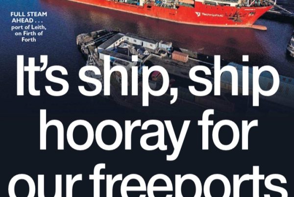 Banner image featuring ships docked at a modern port with green energy infrastructure, overlaid with the headline “It’s ship, ship hooray for our freeports”.
