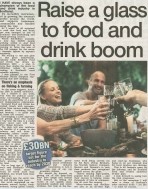 A vibrant image featuring Scottish produce like whisky, salmon, and local craft beers arranged against a backdrop of Scottish countryside, highlighting the booming food and drink industry.
