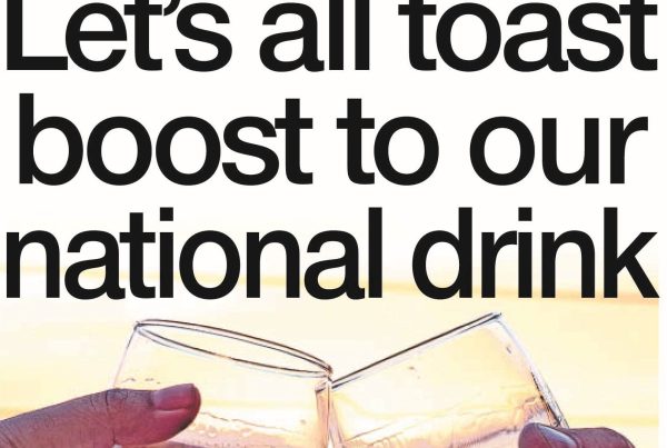 Shaf Rasul alongside whisky barrels with headline text “Let’s All Toast Boost to Our National Drink”.