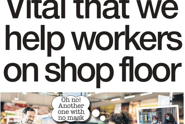 Retail worker wearing a mask behind a till, with the headline “Vital That We Help Workers on Shop Floor”