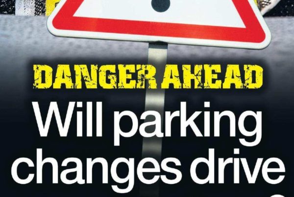 An evening street view of Glasgow with empty parking bays and a parking meter reading "Charges Apply Until 10PM". Headline overlay: “Will parking changes drive away custom?”