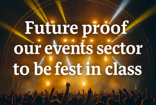 A large crowd enjoys a live outdoor music festival at night, with a brightly lit stage, colorful beams of light, and the headline “Future proof our events sector to be fest in class” displayed prominently in white text.