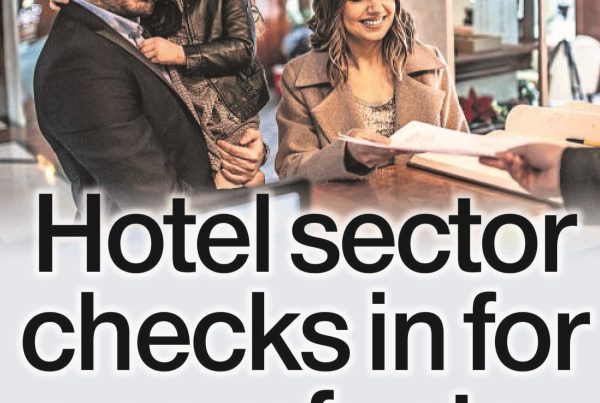 A banner image featuring a welcoming Scottish hotel façade with a “Hotel Sector Checks In for a Comfy Stay” headline, possibly overlaid with tourist imagery or summer scenery.