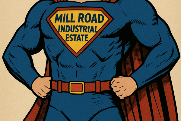 Superhero figure with “Mill Road Industrial Estate” logo on chest, symbolising strength and innovation